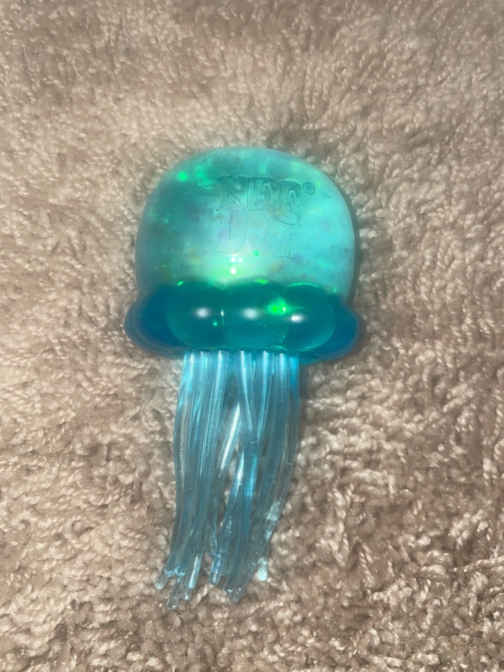 Barely used Needoh Iridescent Blue Jellyfish squishy